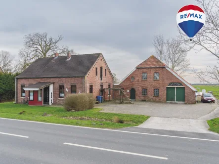 Startbild - Haus kaufen in Schortens / Accum - Der Traum vom eigenen Hof - modernisiertes Einfamilienhaus mit großer Scheune in Schortens