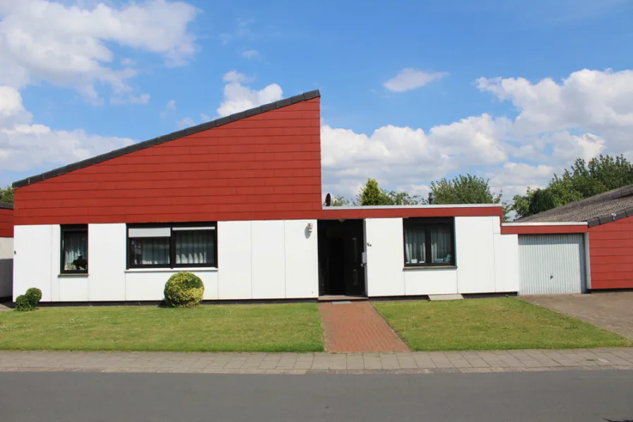  - Haus kaufen in Cloppenburg / Emstekerfeld - Einfamilienhaus mit Einliegerwohnung im außergewöhnlichen Design auf einem großen Grundstück.