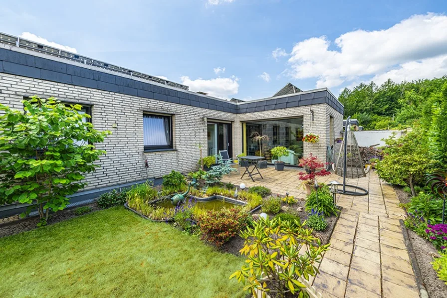 Atriumgarten - Haus kaufen in Hilden - Attraktiver, heller und großzügiger Bungalow in Hilden Süd