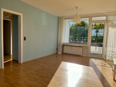 Wohnzimmer - Wohnung kaufen in Erkrath - Ihr neues Zuhause: 3-Zimmer-Wohnung mit beeindruckendem Ausblick!