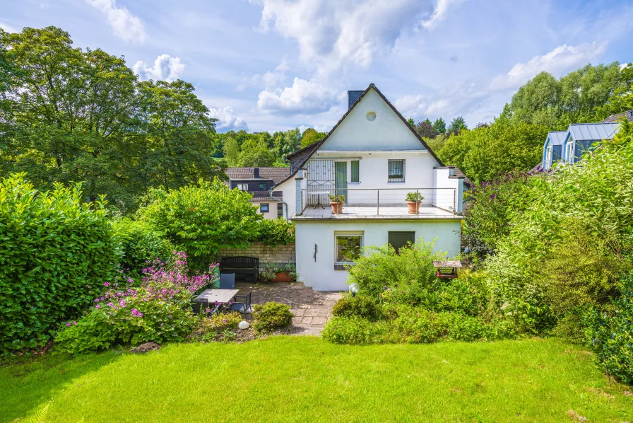 Ihre grüne Oase mitten in Metmann - Haus kaufen in Mettmann - Familienidylle pur: Einzigartiges Zuhause am Hang