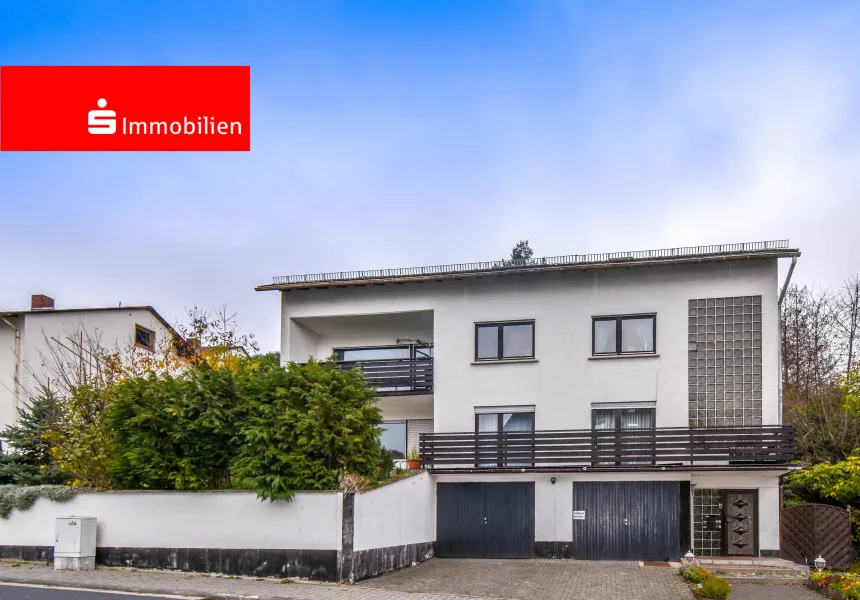 Straßenansicht - Haus kaufen in Runkel - Zweifamilienwohnhaus in Runkel-Wirbelau