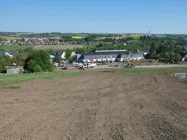 Blick Richtung Oschitzer Straße - letzter Bauabschnitt - Fertigstellung Straße Baufeld 51 bis 59