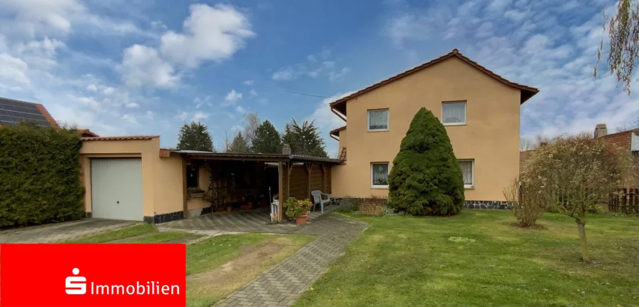 Titelbild - Haus kaufen in Greußen - Solides Einfamilienhaus in ruhiger Ortsrandlage 