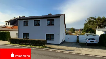 Titelbild - Haus kaufen in Bad Frankenhausen - Zeitgemäßes Einfamilienhaus mit großzügigem Garten