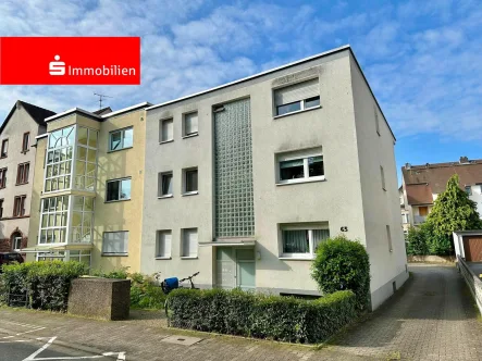 Vorderansicht - Wohnung kaufen in Offenbach - Vermietete 2 Zi.-ETW inkl. Stellplatz - Gute Wohnlage!