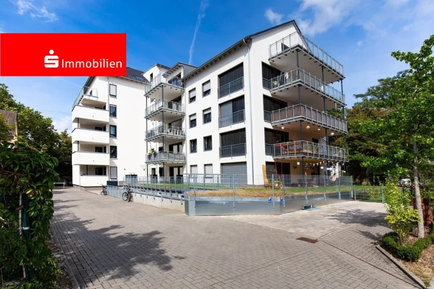 Rückansicht - Wohnung kaufen in Offenbach - Moderne 4 Zimmer Wohlfühloase mit großem Garten und hochwertiger Ausstattung in gesuchter Wohnlage!