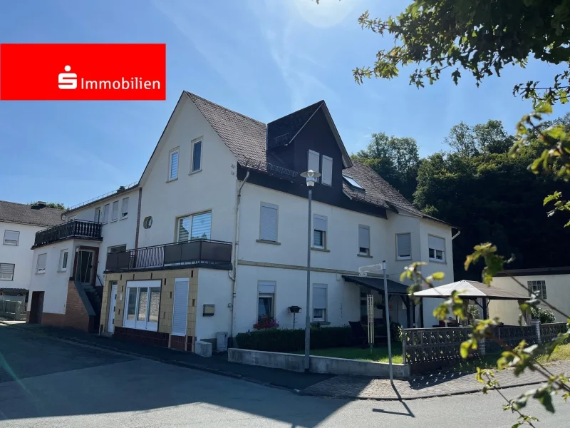  - Haus kaufen in Dillenburg - Kapitalanlage - Einfamilienhaus mit Garten und drei Garagen!