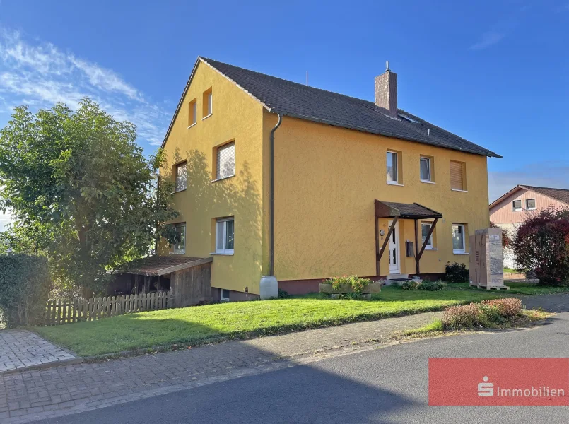 Zweifamilienhaus mit ausgebauten Dachgeschoss - Haus kaufen in Neuhof - Alle Wünsche unter einem Dach mit bezauberndem Weitblick &Option auf nebenliegendes Baugrundstück