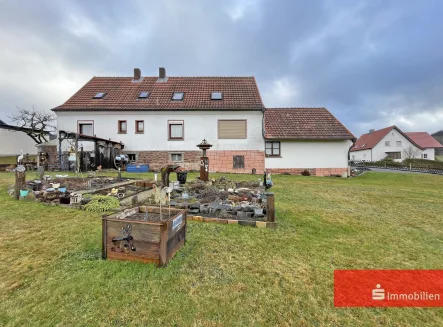 Einfamilienhaus in Hosenfeld - Haus kaufen in Hosenfeld - Ein-/Zweifamilienhaus mit herrlicher Gartenidylle Doppelgarage & Werkstatt - Platz für Heimwerker