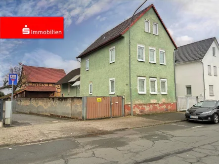 Titelbild - Haus kaufen in Gießen - Einfamilienhaus mit hohem Potenzial in Wieseck