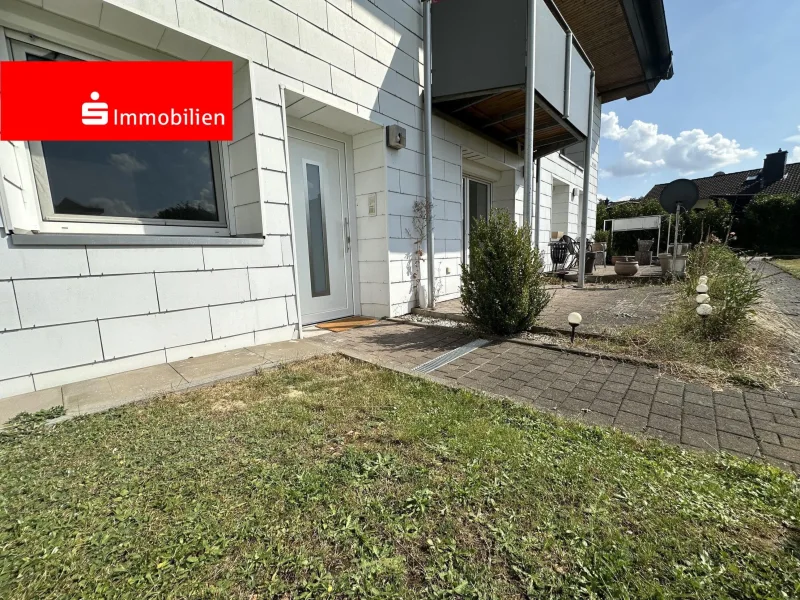  - Wohnung kaufen in Stadtallendorf - Charmante Appartementwohnung  mit eigenem Eingang und sonniger Terrasse