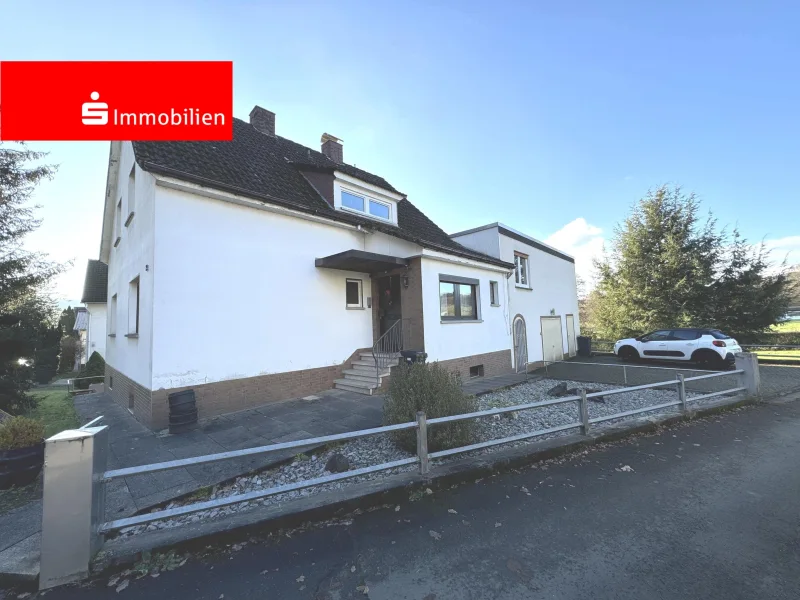  - Haus kaufen in Gladenbach - Massives Wohnhaus in herrlicher Ortsrandlage von Weidenhausen!