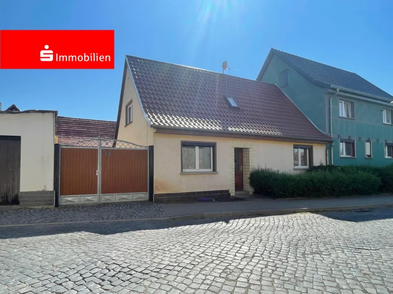 Straßenansicht - Haus kaufen in Großneuhausen - Traumhaus mit 90 m² Wohnfläche in Großneuhausen - beeilen Sie sich!