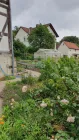 Gewächshaus mit Garten