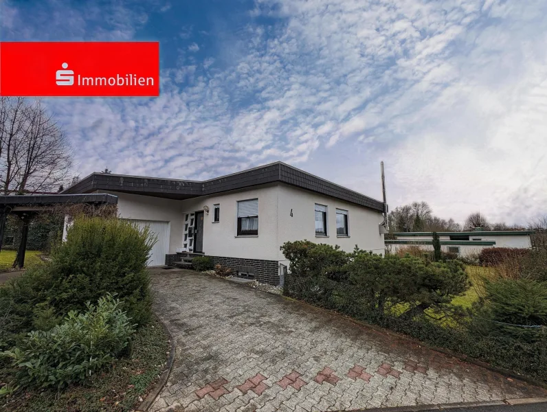 Ansicht - Haus kaufen in Korbach - Bungalow mit Einliegerwohnung in Traumlage