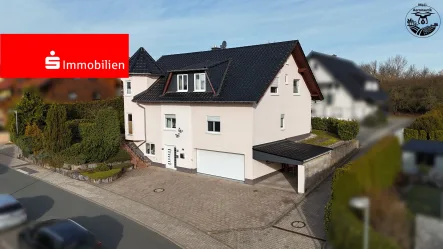 front - Haus kaufen in Frankenberg - Ihr neues Traumhaus in Frankenberg – Stilvolles Zweifamilienhaus in ruhiger Wohnlage