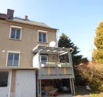 rückwärtige Ansicht mit Balkon