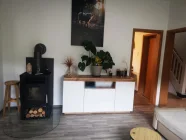 Wohnzimmer mit Kamin EG