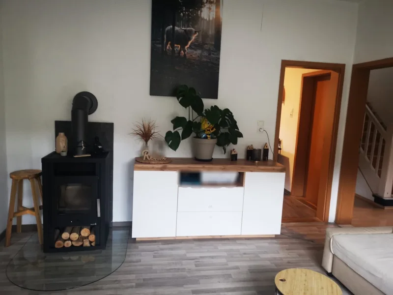 Wohnzimmer mit Kamin EG