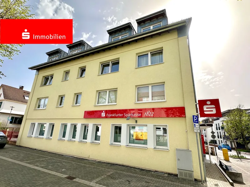 Außenansicht - Zinshaus/Renditeobjekt kaufen in Steinbach - Steinbach (Taunus): Modernisiertes Wohn- und Geschäftshaus in zentraler Lage