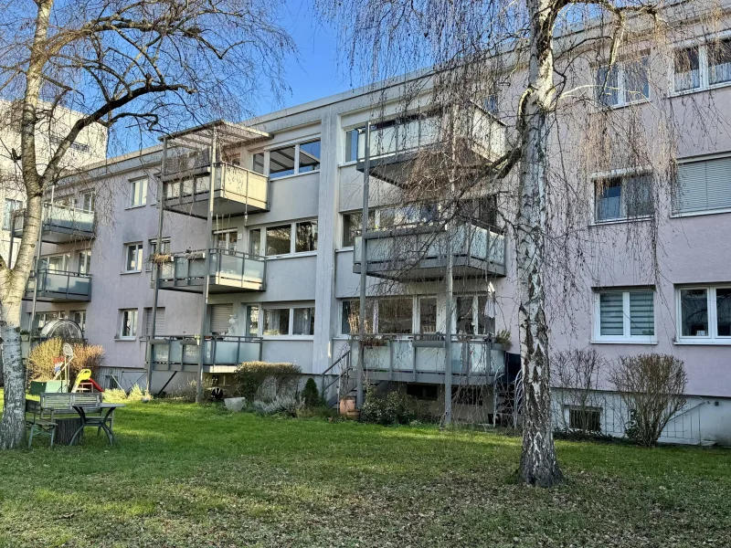 Außenansicht hinten mit Gemeinschaftsgarten