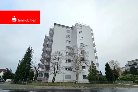 Außenansicht - Wohnung kaufen in Neu-Anspach - Neu-Anspach: Vermietete 2-Zimmerwohnung mit Balkon und KFZ-Stellplatz 