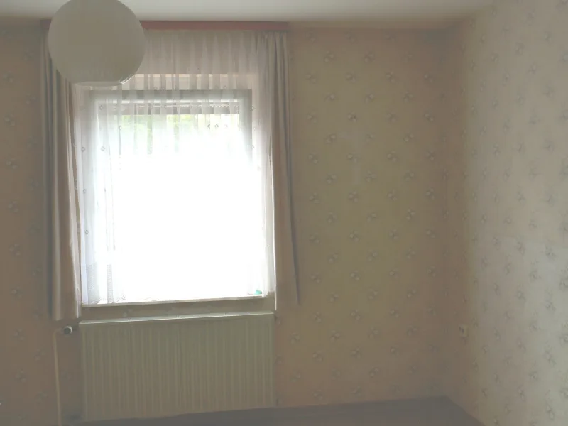 Altbau EG Schlafzimmer