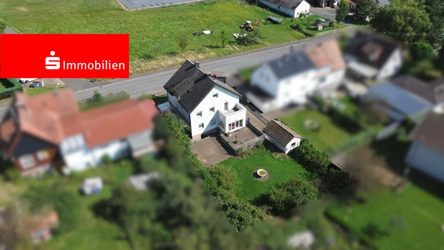 Luftbild - Haus kaufen in Birstein - # Bezugsfertig! Renovierte Immobilie mit viel Platz und schönem Grundstück #