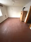 Wohnzimmer mit Kachelofen OG
