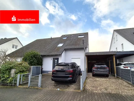 Ansicht - Wohnung kaufen in Dreieich - Moderne Maisonettewohnung mit Garten und Carport in Dreieich Offenthal