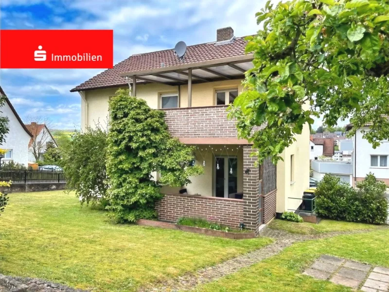 Rückansicht - Haus kaufen in Melsungen - Freistehendes ZFH in ruhiger Lage mit 3 Garagen