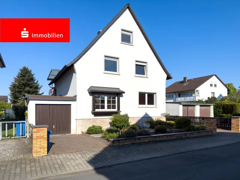 Hausansicht - Haus kaufen in Seligenstadt - Charmantes Zweifamilienhaus mit großem Garten – Ihr neues Zuhause wartet auf Sie!
