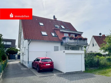 Außenansicht - Wohnung kaufen in Mühlheim - Gemütliche Maisonette-Wohnung in ruhiger Lage