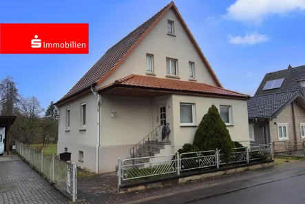 Straßenansicht links - Haus kaufen in Barchfeld-Immelborn - Einfamilienhaus in ruhiger Wohnlage