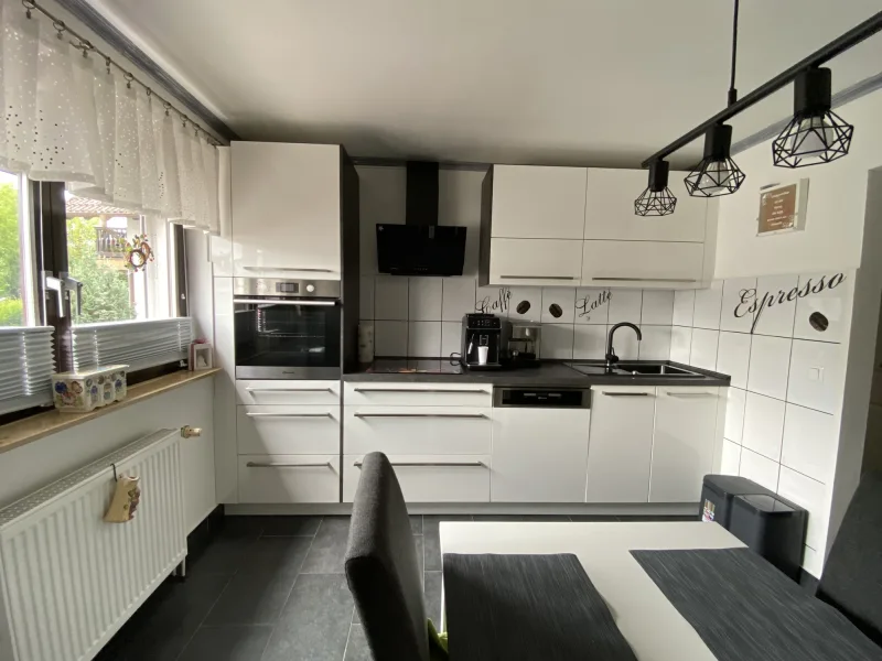  - Wohnung kaufen in Ludwigshafen - Häuschen mit Garten und Garage zum Preis einer Wohnung