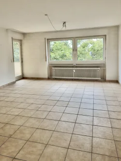  - Wohnung kaufen in Mutterstadt - Attraktive Wohnung mit zwei Balkonen und Stellplatz – Perfekt für Ihre individuellen Renovierungsideen