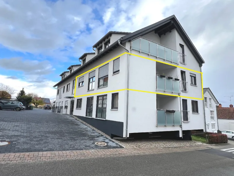 Hausansicht - Wohnung kaufen in Bruchsal - Ruhig gelegene 3-Zimmer-Wohnung mit Loggia und Stellplatz in Bruchsal-Helmsheim