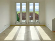 OG: Wohnzimmer in der neuen Dachgaube mit Panoramablick