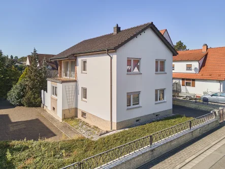 Fassadenansicht - Haus kaufen in Schifferstadt - EFH auf großem Grundstück mit uneinsehbarem Garten und vielseitigen Nutzungsmöglichkeiten!