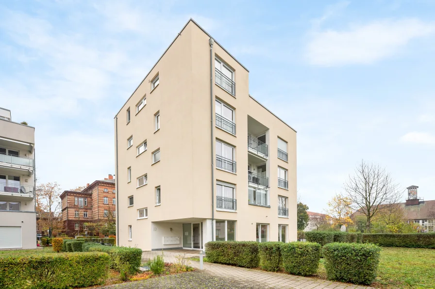 Hausansicht - Wohnung kaufen in Speyer - Quartier Normand: moderne Wohnung mit Garten