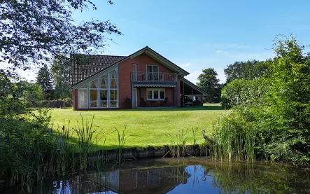 _Titelbild  - Haus kaufen in Neumünster - VERKAUFT | Energieeffizientes Wohnhaus mit Lagerhalle, Werkstatt und PV-Anlage