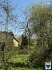 Seitenansicht Haus mit Grundstück