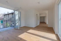 Wohnbereich mit Zugang zur Dachterrasse