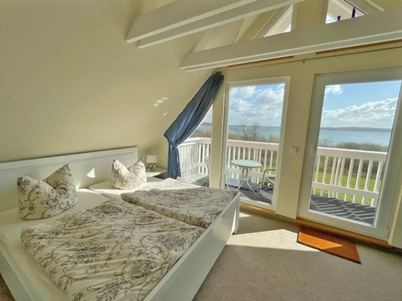 Schlafzimmer Dachgeschoss mit Balkon