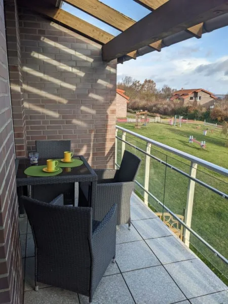 Gemütlicher Balkon mit Wasserblick