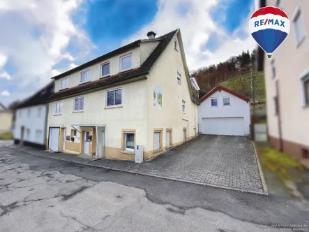 Ausenansicht - Haus kaufen in Horb am Neckar - Wohlfühlen im Herzen von Rexingen: Zweifamilienhaus mit Nebengelass
