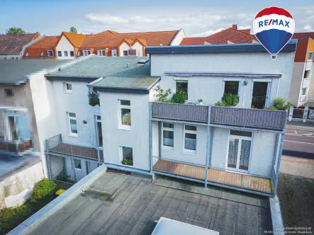 rückhausansicht - Haus kaufen in Schönebeck (Elbe) - Attraktives Wohn- und Geschäftshaus in Schönebeck: Eine Investition in Ihre Zukunft