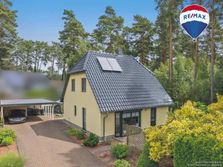 Titelbild - Haus kaufen in Fichtenwalde - Charmantes Einfamilienhaus umgeben von Naturidylle!