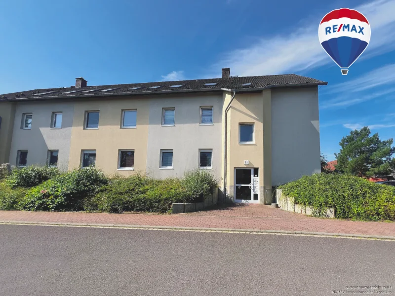 Hausansicht - Wohnung kaufen in Niederndodeleben - Traumhafte 3-Zimmer-Wohnung mit sonniger Terrasse